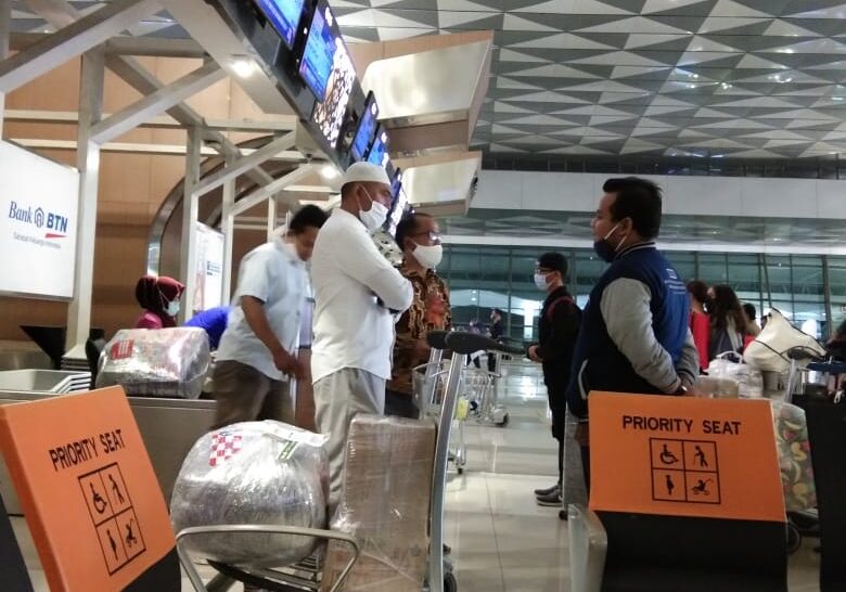 Proses Check in Bandara